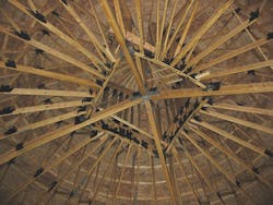 Wood truss ceiling in a salt storage building Wood truss ceiling in a salt storage building
