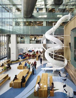 The colorful ribboned flooring at Torontos Corus Quay mimics the iconic corkscrew slide and draws attention to visible pathways The colorful ribboned flooring at Torontos Corus Quay mimics the iconic corkscrew slide and draws attention to visible pathways