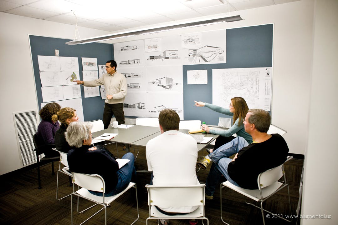 A project undergoes design review at MHTN Architects, a 65-member firm based in Salt Lake City. The Best Firm to Work For has