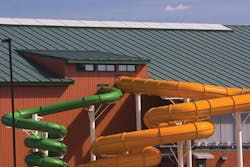 The four-inch-thick Metl-Span insulated roof panels are finished in Cool Forest Green on the exterior and Polar White on the int The four-inch-thick Metl-Span insulated roof panels are finished in Cool Forest Green on the exterior and Polar White on the int