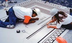 Decorative concrete is growing in popularity for both interior and exterior applications. The trade workers shown here are weed Decorative concrete is growing in popularity for both interior and exterior applications. The trade workers shown here are weed