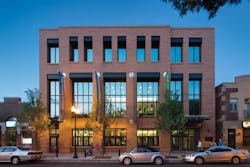 Vertical Elements And Orange Brick On The Old Town Schools New East Building Evoke The Faade Of The Clients Headquarters Across The Street, Which Was Created Through Adaptive Reuse Of An Art Deco Library Precast Concrete Panels Interpret The Word Music In Ancient And Modern Languages Vertical Elements And Orange Brick On The Old Town Schools New East Building Evoke The Faade Of The Clients Headquarters Across The Street, Which Was Created Through Adaptive Reuse Of An Art Deco Library Precast Concrete Panels Interpret The Word Music In Ancient And Modern Languages