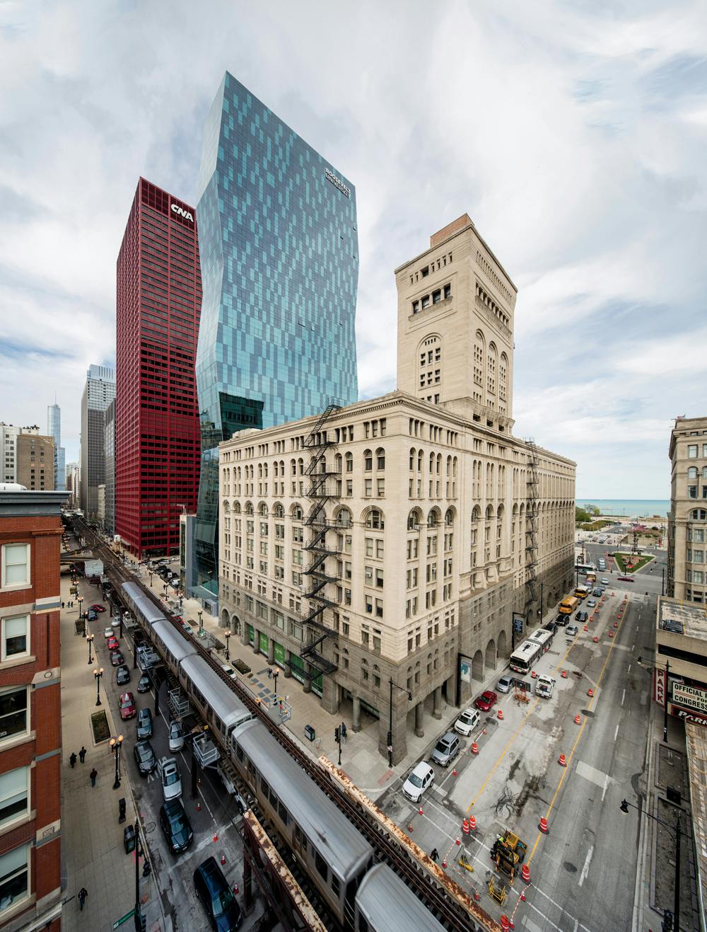 The Wabash Building (blue) Is A Modern Response To Roosevelt Universitys Needs That Also Preserves The Schools Connection To The Historic Auditorium Building (foreground) This View Looking Northeast Shows The Proximity Of Rapid Transit, With Lake Michigan In The Background