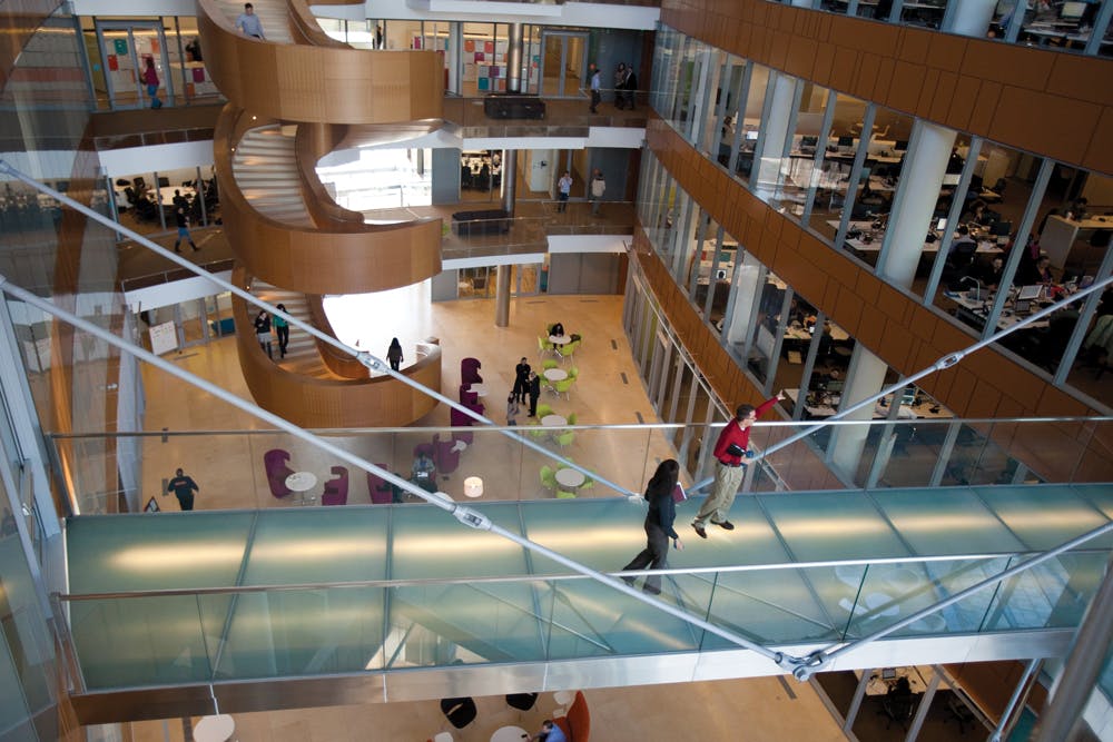 GlaxoSmithKline recently opened a 208,000-sf office in Philadelphias Navy Yard Corporate Center. Its 1,300 workers are assigned to neighborhoods and can grab any available workstation. The facility, targeting LEED Platinum for both Core & Shell and CI, has a coffee shop, cafeteria, fitness center, rooftop garden, bank, and tech help center. On the Building Team: Robert A.M. Stern (design architect), Kendall/Heaton (AOR), Francis Cauffman (workplace consultant, interiors), Wick Fisher White (MEP/fire engineer, interiors), and Thornton Tomasetti (SE). PHOTO: JOHN GEORGE