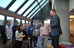 Tom Wujec, Autodesk Fellow and Lead Facilitator for the U40 Vision Competition, talks with some of the winning teams before thei Tom Wujec, Autodesk Fellow and Lead Facilitator for the U40 Vision Competition, talks with some of the winning teams before thei