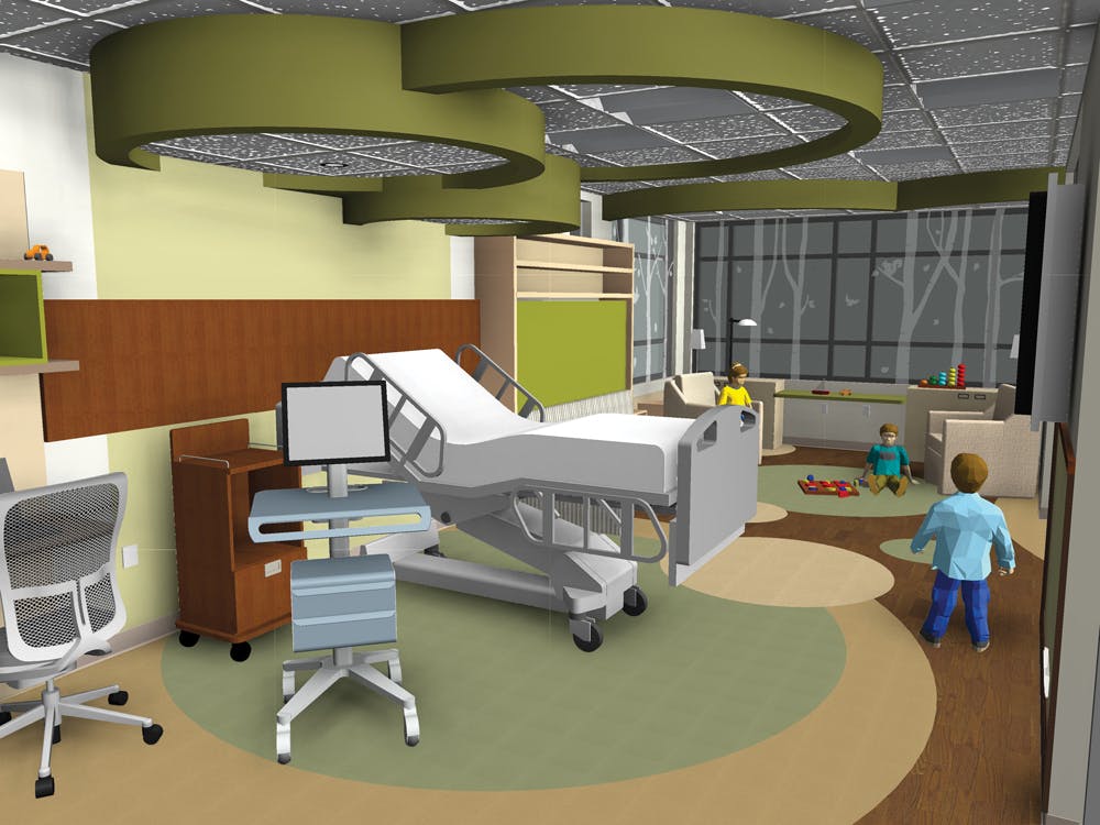 The module showcases a range of interior finishes, with a treatment/recovery area, specialized bathroom, workstation for medical