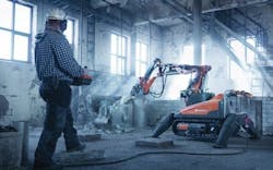Husqvarnas DXR140 demolition robot in action. The robot shown here is controlled by remote human operation, though other models Husqvarnas DXR140 demolition robot in action. The robot shown here is controlled by remote human operation, though other models