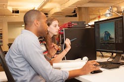 Jevon Carrington and Leila Schey, both Architectural Designers in Genslers Washington, D.C., office, collaborate on a project u Jevon Carrington and Leila Schey, both Architectural Designers in Genslers Washington, D.C., office, collaborate on a project u