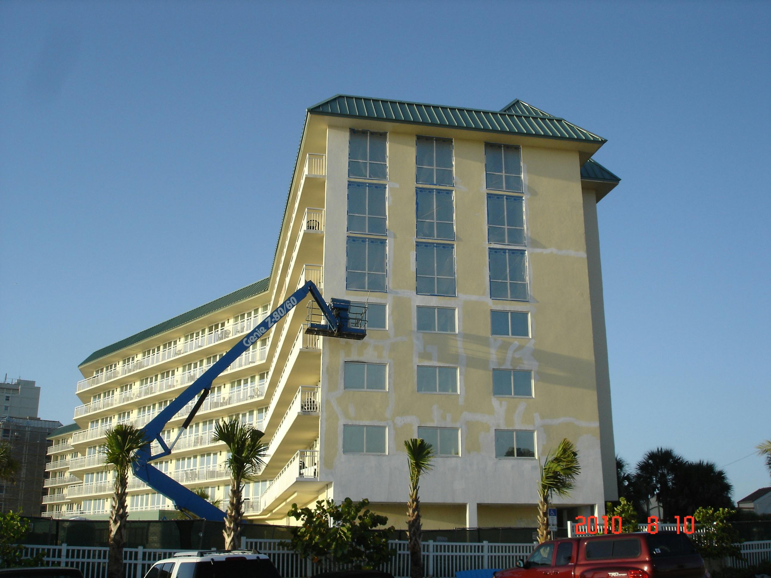The extent of concrete deterioration was so severe that the balconies and walkways were completely removed and replaced with new