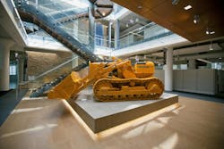 A 1953 Allis-Chalmers bulldozer in the central atrium of the Walsh Training and Conference Center, Chicago. The 93,000-sf LEED P A 1953 Allis-Chalmers bulldozer in the central atrium of the Walsh Training and Conference Center, Chicago. The 93,000-sf LEED P