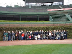 Dont touch the ivyits historic! The U40 Leadership Summit participants assembled before the 400-foot centerfield sign at Wrig Dont touch the ivyits historic! The U40 Leadership Summit participants assembled before the 400-foot centerfield sign at Wrig