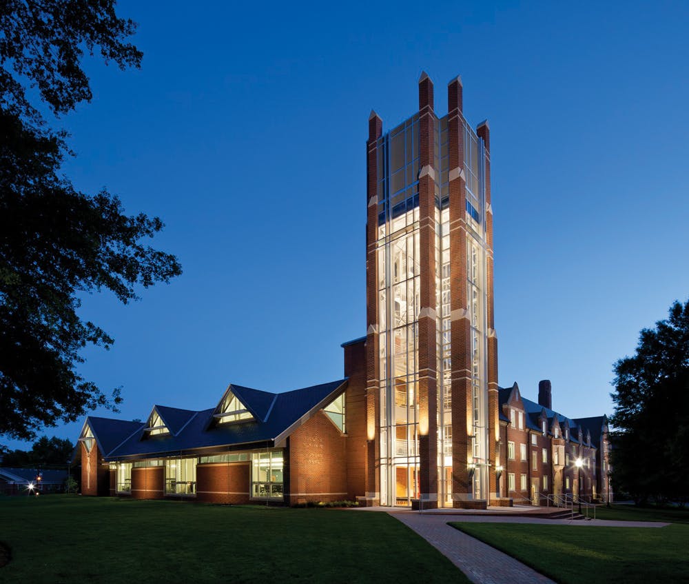 The Tower At The Vernon S Broyles Leadership Center Unifies A New Addition (left) With The Rehabilitated Simons Law Building (right) The Glass Tower, Which Was Built To Support A Future Carillon, Features Brick Piers That Reinforce The Projects Neo Gothic Style