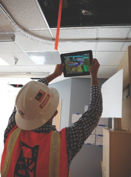 Augmented reality allows AEC professionals and facility managers to see behind walls and above ceilings. Photo: McCarthy Building Companies