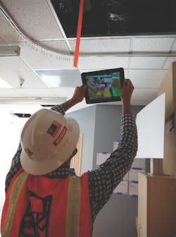 Augmented reality allows AEC professionals and facility managers to see behind walls and above ceilings. Photo: McCarthy Building Companies Augmented reality allows AEC professionals and facility managers to see behind walls and above ceilings. Photo: McCarthy Building Companies