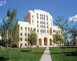 The project restored the buildings courtrooms and public corridors to their original, warm terra cotta hues. It also involved r The project restored the buildings courtrooms and public corridors to their original, warm terra cotta hues. It also involved r