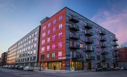 The panels have rectangular dimensions, with shades of red and gray to mirror the colors of the brick and concrete on nearby his The panels have rectangular dimensions, with shades of red and gray to mirror the colors of the brick and concrete on nearby his