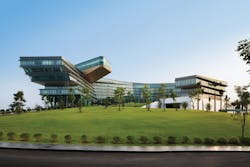 The JW Marriott Hanoi features an unusual cantilevered design, with a curled shape inspired by the form of a dragon. The arms of The JW Marriott Hanoi features an unusual cantilevered design, with a curled shape inspired by the form of a dragon. The arms of