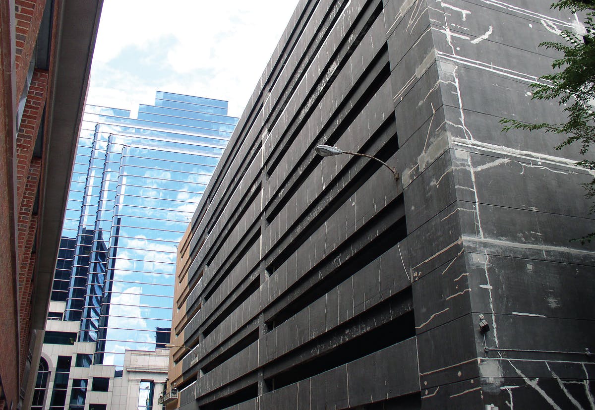 Shear cracks riddle the exterior wall of this urban parking structure. Courtesy Hoffmann Architects