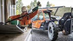 Pete Van Lier Replaces A Hose After Filling A Forklift With Plant Based Diesel At Our Construction Yard In Mountlake Terrace Pete Van Lier Replaces A Hose After Filling A Forklift With Plant Based Diesel At Our Construction Yard In Mountlake Terrace