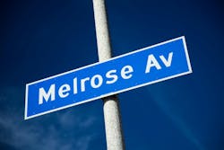 Outdoor daylight photo of Melrose Ave. sign with blue sky in Los Angeles. Photo: billnol via iStock Outdoor daylight photo of Melrose Ave. sign with blue sky in Los Angeles. Photo: billnol via iStock