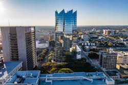 Frost Tower in San Antonio, Top 95 University Construction Firms, 2019 Giants 300 Report, Photo courtesy of Weston Urban, KDC, White Cloud Drones, Clark Group Frost Tower in San Antonio, Top 95 University Construction Firms, 2019 Giants 300 Report, Photo courtesy of Weston Urban, KDC, White Cloud Drones, Clark Group
