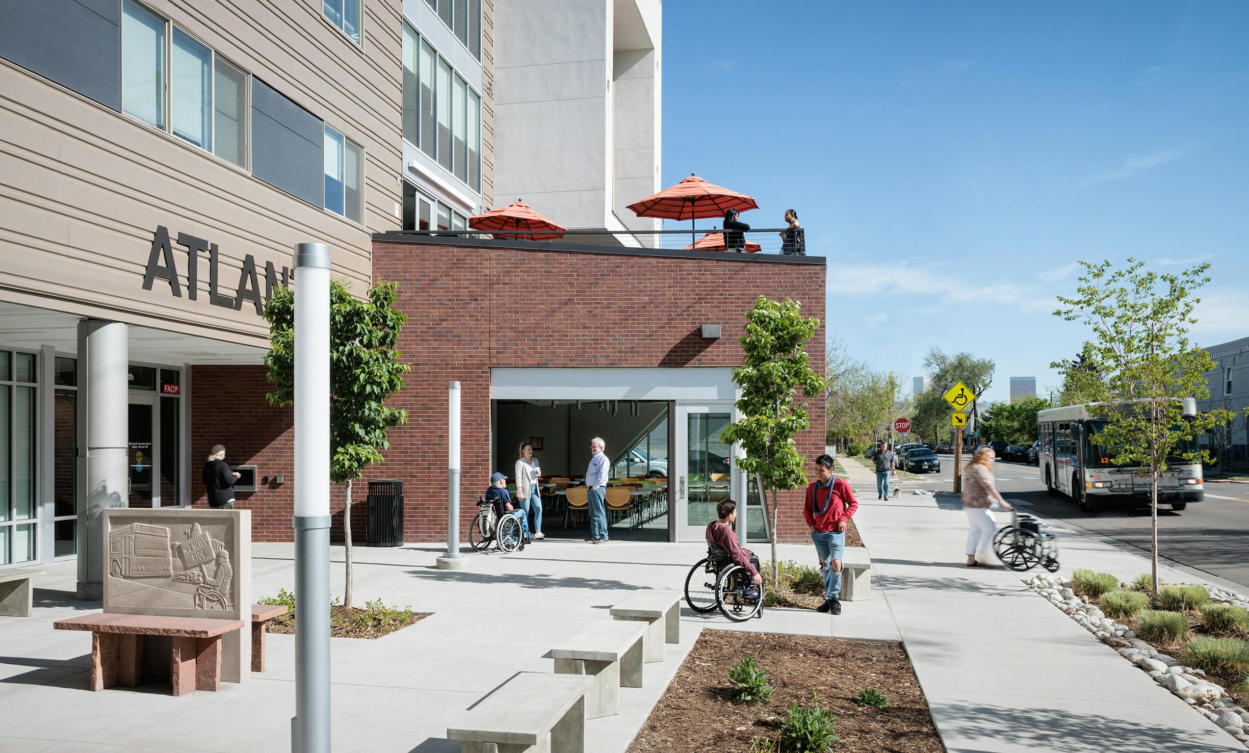 View of accessible building entry and meeting room at Atlantis Apartments, Denver, Colo. Photo &copy; David Lauer Photography Inc