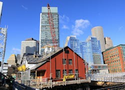 Officials from the Boston Tea Party Ships & Museum to celebrate the raising and placement of the cupola on the roof of the museu Officials from the Boston Tea Party Ships & Museum to celebrate the raising and placement of the cupola on the roof of the museu