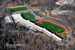 Site constraints led to the configuration of the building as a continuous ribbon stretched along the edge of a large, open plane Site constraints led to the configuration of the building as a continuous ribbon stretched along the edge of a large, open plane