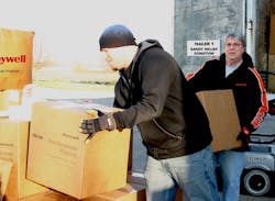 Honeywell Employees Offloading Truck Of Donated First Responder Supplies In Response To Hurricane Sandy Honeywell Employees Offloading Truck Of Donated First Responder Supplies In Response To Hurricane Sandy