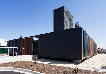Twenty- and 40-ft shipping containers were used to create an office building for a shipping-container specialist. All photos by