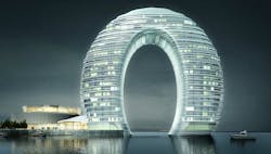 Located On Lake Tai, The Sheraton Huzhou Hot Spring Resort By Mad Is A 102 Meter Tall Hotel Whose Shape Evokes A Gigantic Ring Located On Lake Tai, The Sheraton Huzhou Hot Spring Resort By Mad Is A 102 Meter Tall Hotel Whose Shape Evokes A Gigantic Ring