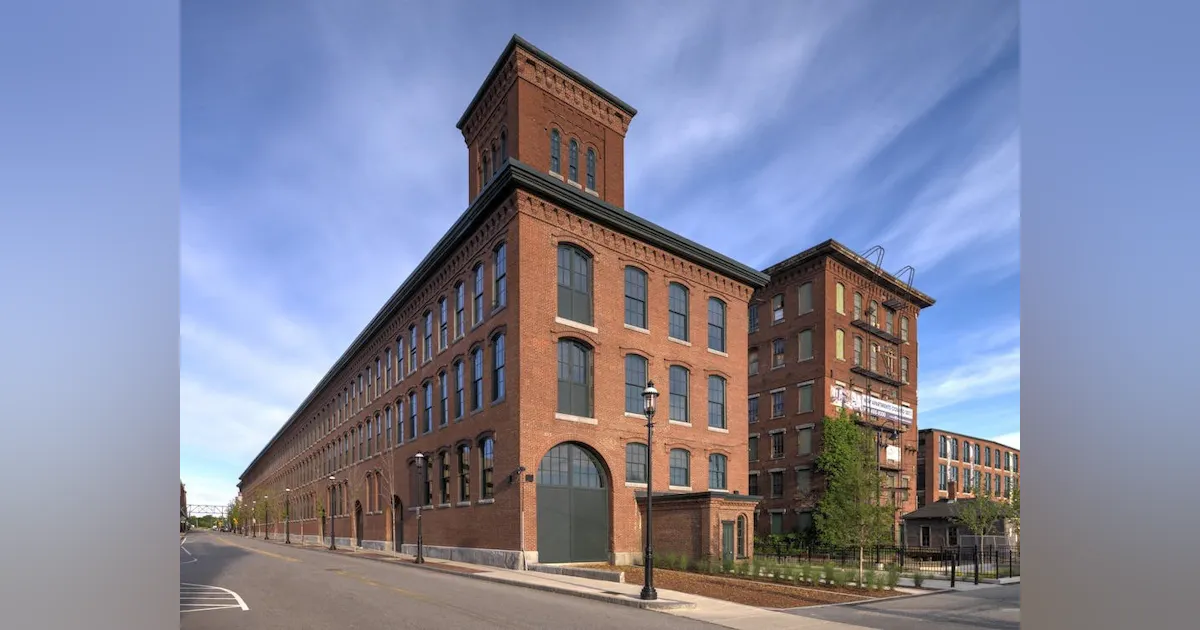 Textile Base Building Textile factory turned multifamily has train tracks running through it ...