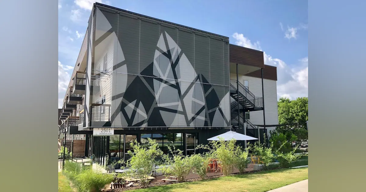 Austin apartment façade branded with metal mesh | Building Design ...
