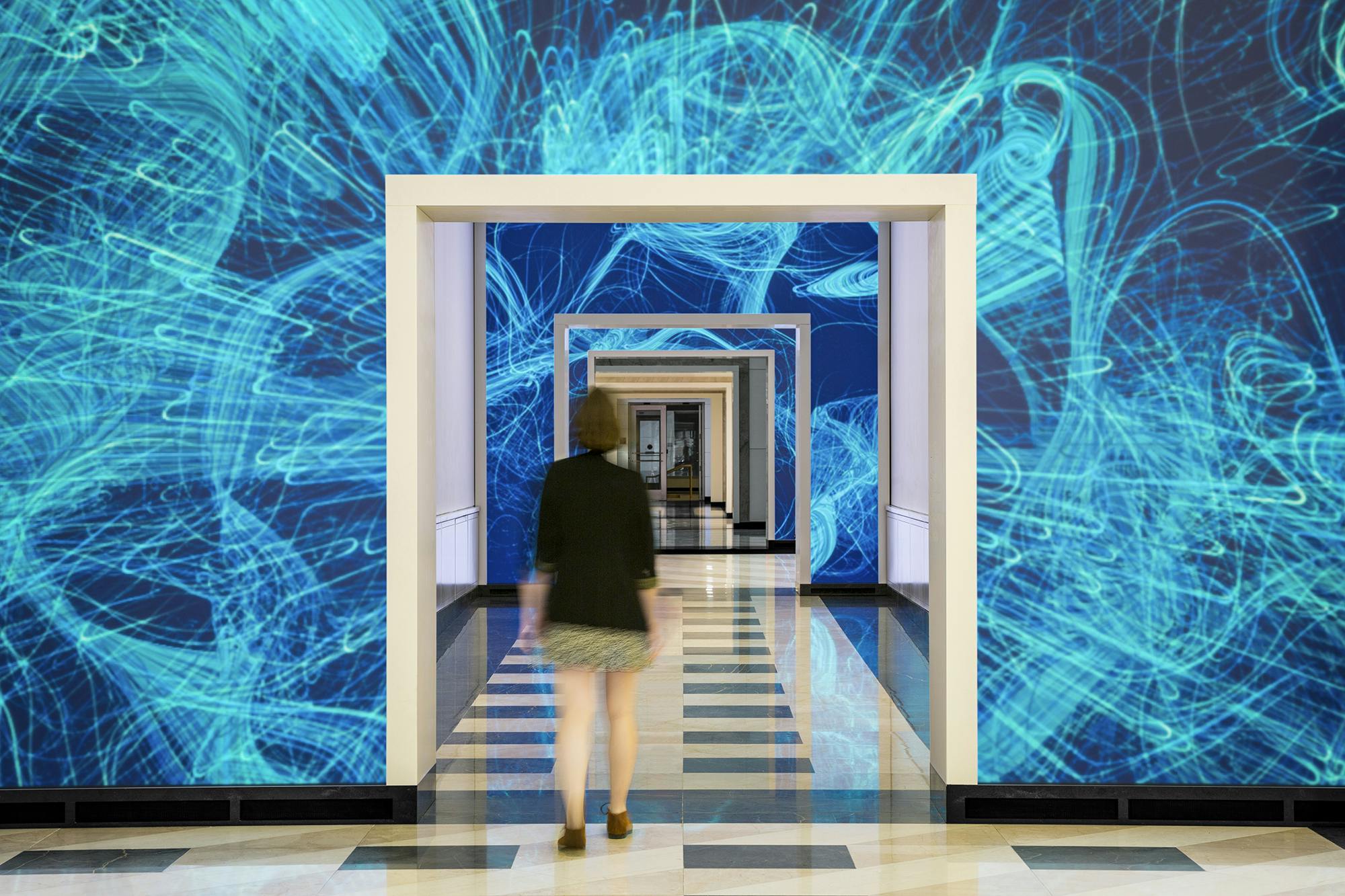 NBBJ acquires immersive technology design studio ESI Design Terrell Place in Washington, D.C., features 1,700-sf of motion-activated LED displays. Photo: Caleb Tkach courtesy EDI Design/NBBJ