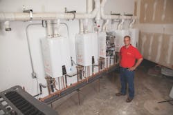 Jason Richards, A+ Plumbing Heating and Cooling, with Navien NPE-240A tankless water heaters Jason Richards, A+ Plumbing Heating and Cooling, with Navien NPE-240A tankless water heaters