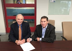 Jerry Yudelson, President of the Green Building Initiative, with Grant Seiffert, President of the Telecommunications Industry As Jerry Yudelson, President of the Green Building Initiative, with Grant Seiffert, President of the Telecommunications Industry As