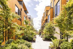 The courtyard sits amid the four structures that comprise Winston Townhomes, Seattle. Photo: Rafael Soldi The courtyard sits amid the four structures that comprise Winston Townhomes, Seattle. Photo: Rafael Soldi