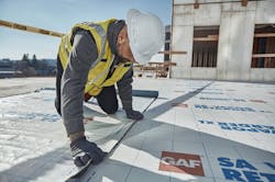 GAF SA Vapor Retarder XL being installed at The Revington rental housing complex, Worcester, Mass. Photo: Courtesy GAF GAF SA Vapor Retarder XL being installed at The Revington rental housing complex, Worcester, Mass. Photo: Courtesy GAF