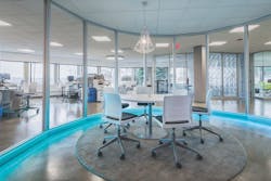 A Central Conference Room Illuminated With Blue Led Accent Lighting Is A Core Element Of The New 21,000 Sf Corporate Headquarters For Business Services Firm The Predictive Index The Fit Out Project Used Extensive Interior Glass Walls And Doors To Create An Office With Glass Walls That Is Open And Flexible A Central Conference Room Illuminated With Blue Led Accent Lighting Is A Core Element Of The New 21,000 Sf Corporate Headquarters For Business Services Firm The Predictive Index The Fit Out Project Used Extensive Interior Glass Walls And Doors To Create An Office With Glass Walls That Is Open And Flexible