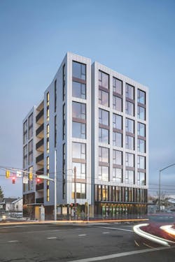 Mass Timber For Multifamily Housing Construction Carbon12 Exterior Night Mass Timber For Multifamily Housing Construction Carbon12 Exterior Night