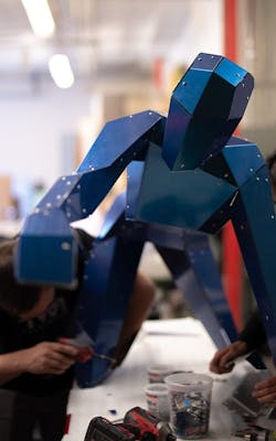 Man fabricating ALUCOBOND aluminum composite material in dimensional shapes Man fabricating ALUCOBOND aluminum composite material in dimensional shapes