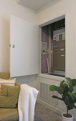 Apanel in the wall of an apartment opens for maintenance access to the MagicPak HVAC unit Apanel in the wall of an apartment opens for maintenance access to the MagicPak HVAC unit