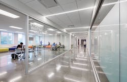Houston Community College Coleman College Student waiting area with students sitting at desks Houston Community College Coleman College Student waiting area with students sitting at desks