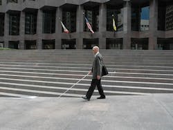 Architect Chris Downey navigates a sidewalk in San Francisco Architect Chris Downey navigates a sidewalk in San Francisco