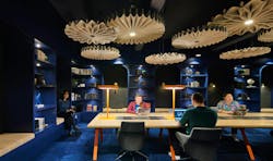 Residents coworking in modern apartment complex Residents coworking in modern apartment complex