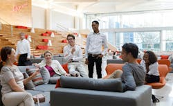 Office workers chatting Office workers chatting