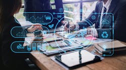 Graphic image of environmental measures superimposed over people working on a project Graphic image of environmental measures superimposed over people working on a project