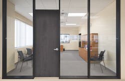 A double-glazed, demountable interior office partition system A double-glazed, demountable interior office partition system