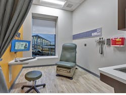 One Of The Clinic's Exam Rooms, From Which Can Be Seen The Elevated Subway Platform Outside One Of The Clinic's Exam Rooms, From Which Can Be Seen The Elevated Subway Platform Outside