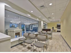 A Dental Waiting Room Looks Out Over The Clinic's Atrium And Onto The Street A Dental Waiting Room Looks Out Over The Clinic's Atrium And Onto The Street
